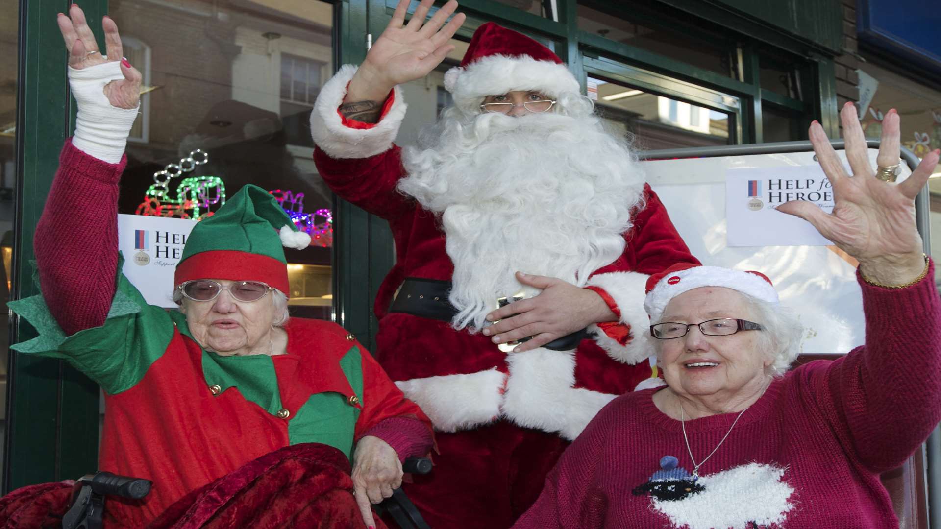 Twins Betty Martin, left, and Jean Brown, 86, with Santa