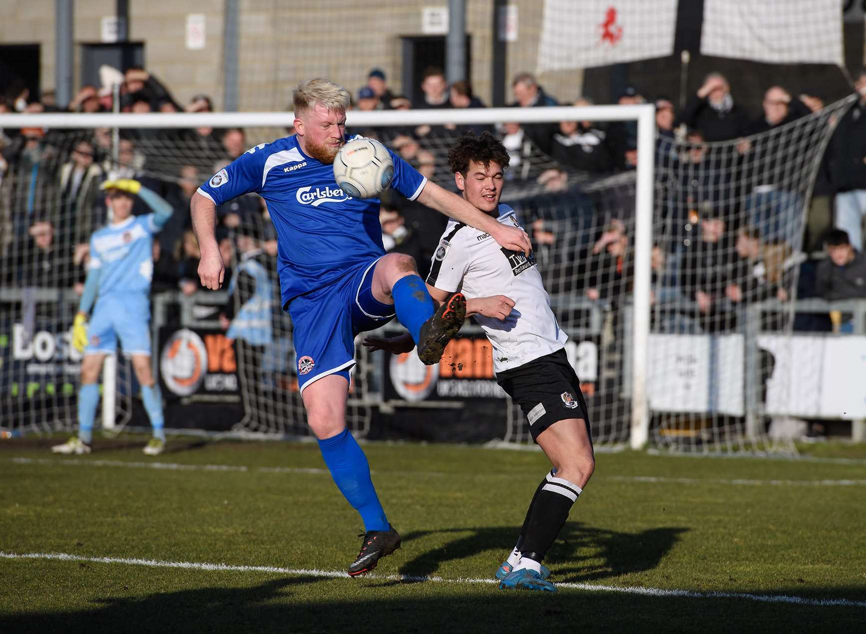 Alfie Pavey challenges for the ball against Truro Picture: Andy Payton