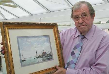 Bernard Broughton with one of the paintings - a water colour of Whitstable Harbour