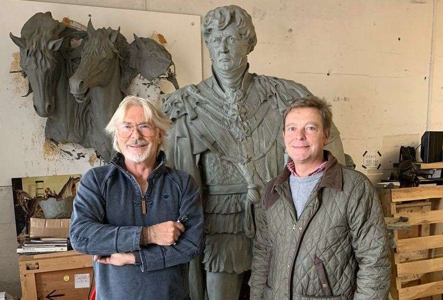 Craig Mackinlay, right, being given a preview of Dominic Grant’s sculpture of George IV