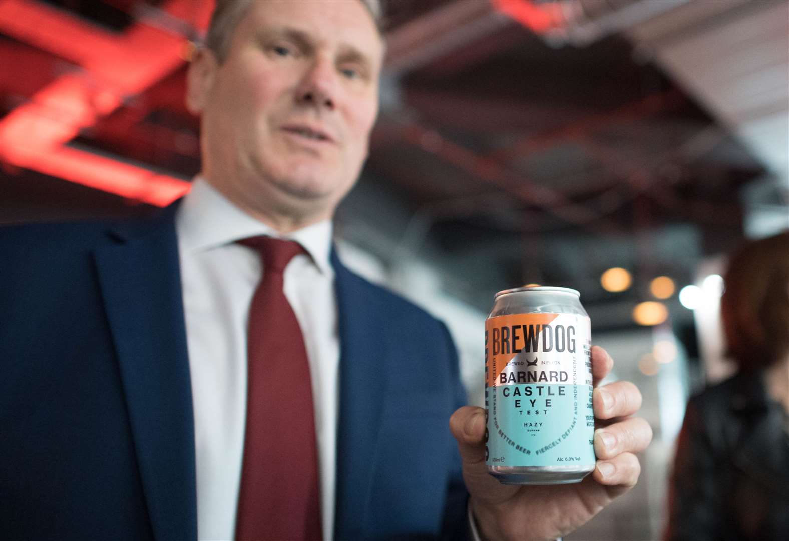 Labour leader Keir Starmer holding a can of ‘Barnard Castle Eye Test’ beer during a visit to the Brewdog Pub and Brewery in the City of London (Stefan Rousseau/PA)