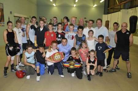 Boxers young and old with Flyweight Champion Kevin Mitchell