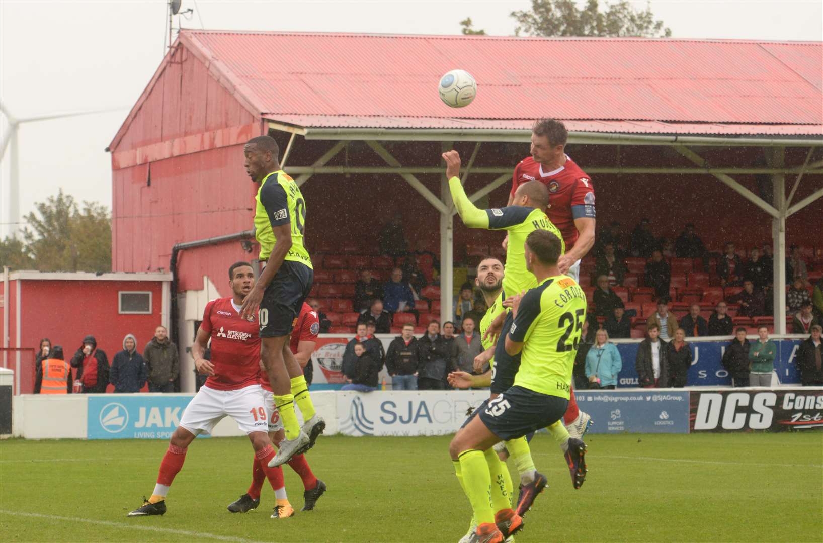 Ebbsfleet captain Dave Winfield up for a header Picture: Chris Davey