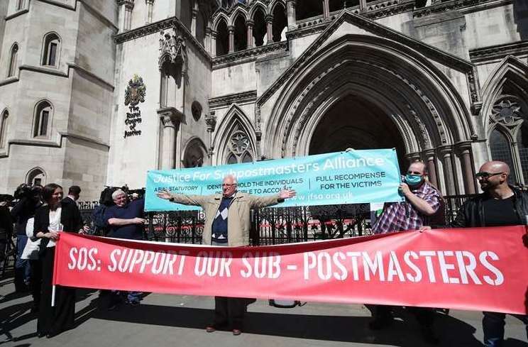 Former post office worker Noel Thomas and other campaigners outside the court. Picture: Yui Mok/PA