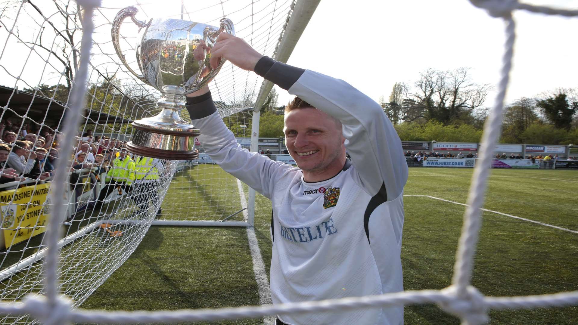 Lee Worgan with the Ryman League Premier Division trophy Picture: Martin Apps
