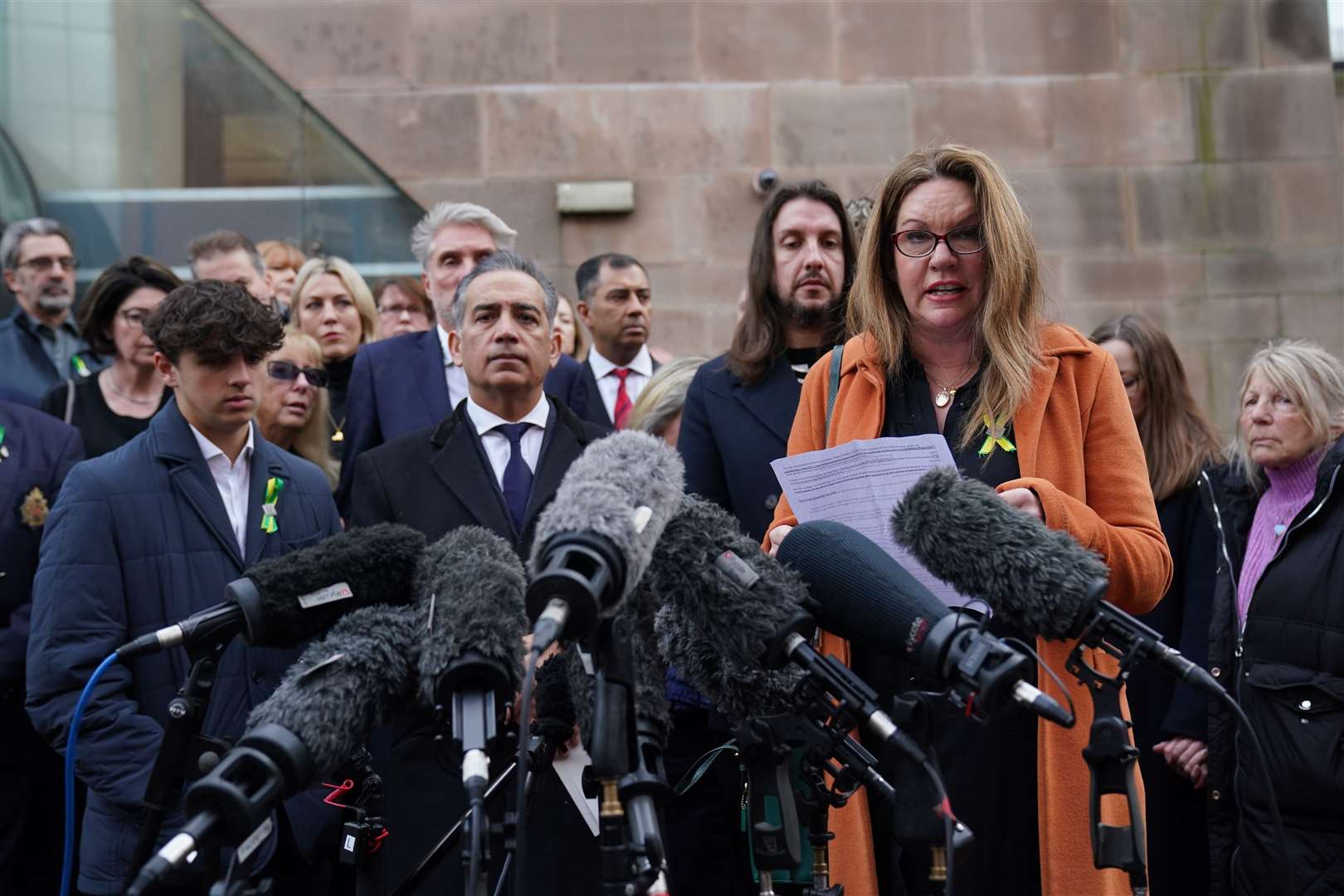 Emma Webber, mother of Barnaby Webber making a statement alongside relatives of the victims, outside Nottingham Crown Court on Thursday (Jacob King/PA)