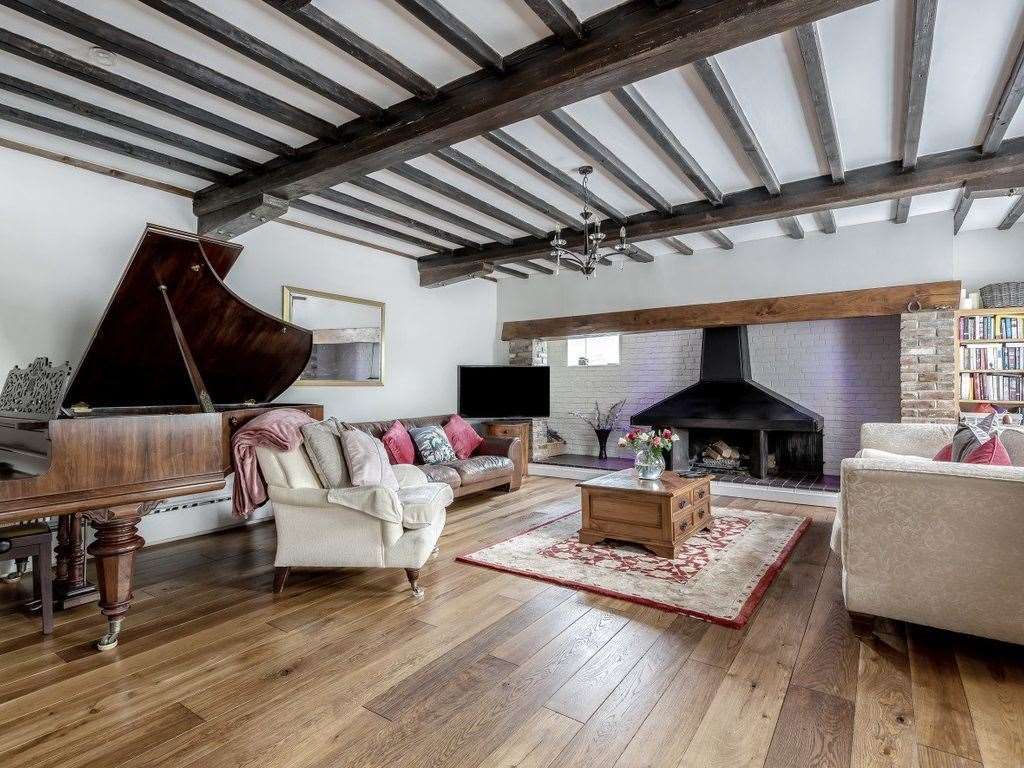 The ceiling beams of this converted oast house give the place a cosy, traditional feel. Photo: Zoopla