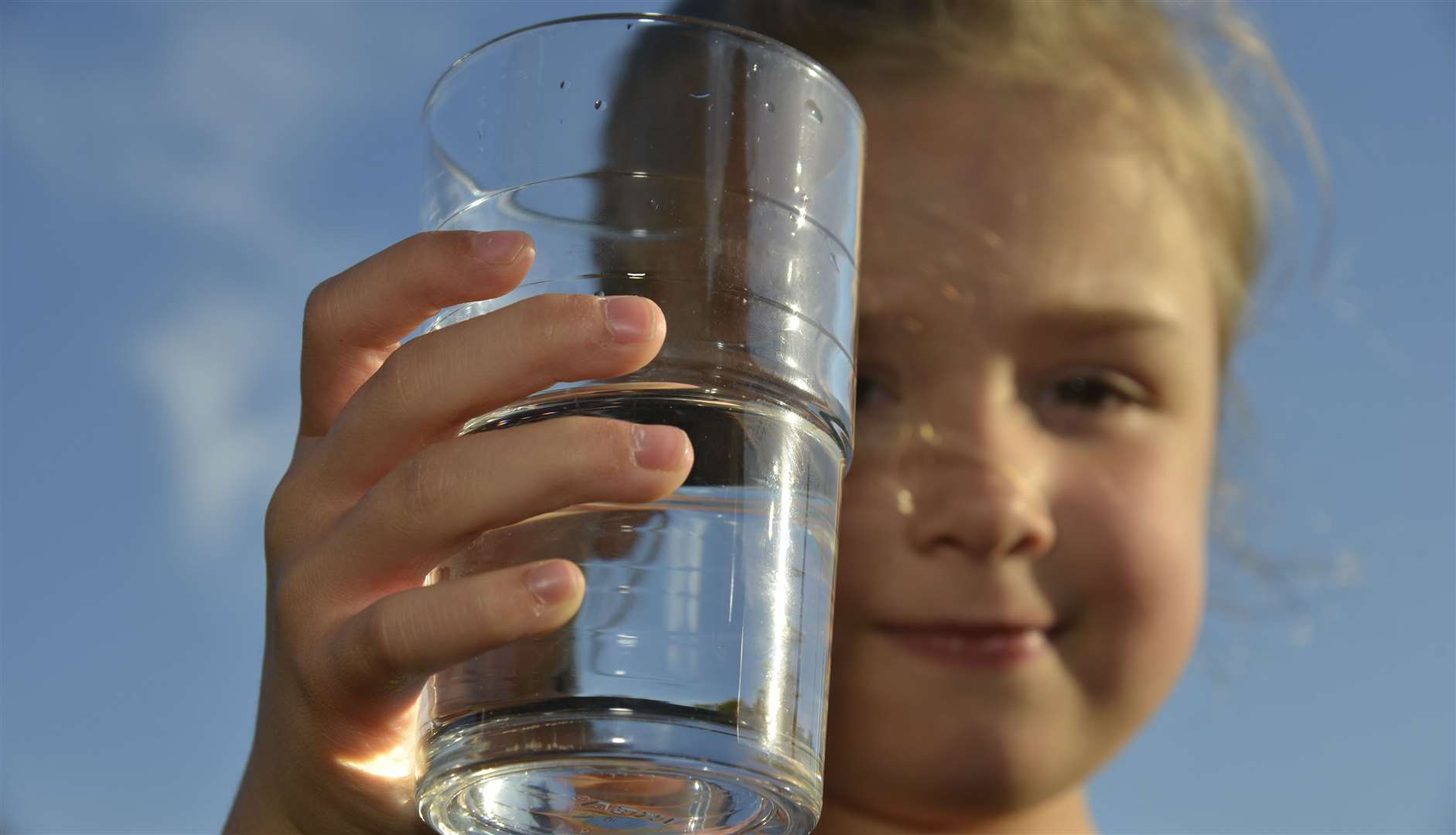 We should all take a leaf out of Ashford primary school pupil Holly Apps' book this summer and drink plenty of water! Picture: Martin Apps (13572336).