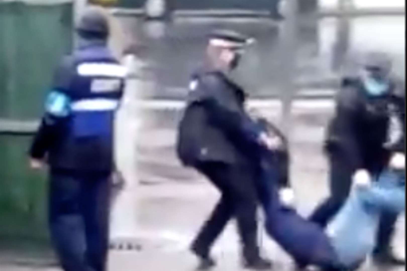 A video has been circulated showing officers carrying an asylum seeker back into the barracks