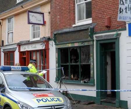 AFTERMATH: the fire-damaged shop. Picture: BARRY DUFFIELD
