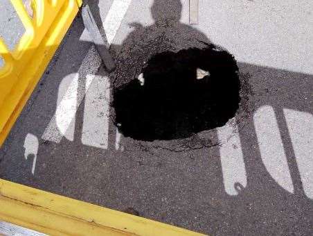 Residents say the sinkhole is bigger below the surface. Picture: Derek Harman