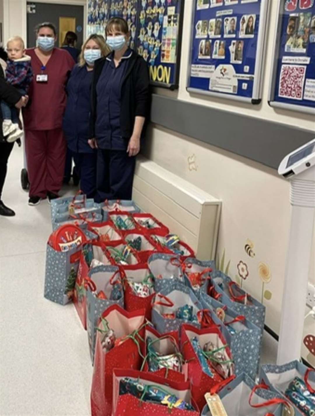 The 24 gift bags were handed to the unit at the William Harvey