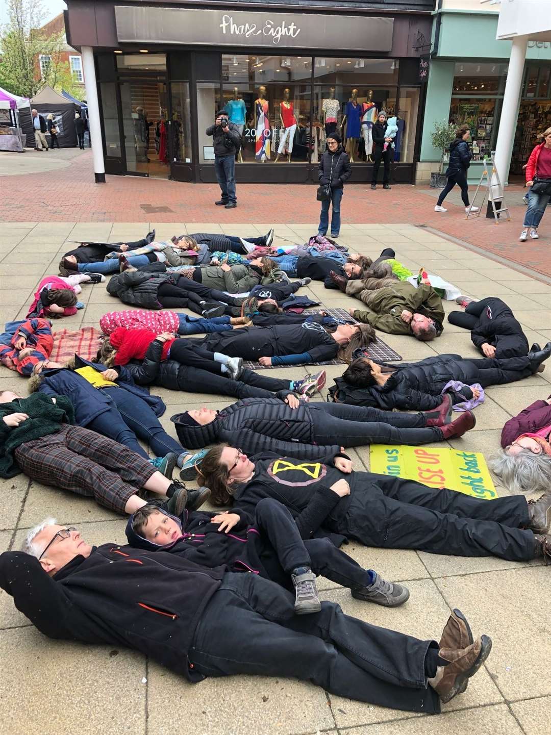 Extinction Rebellion protesters held a die-in in Bligh's Court, Sevenoaks. Picture: Giles Winser (9247017)