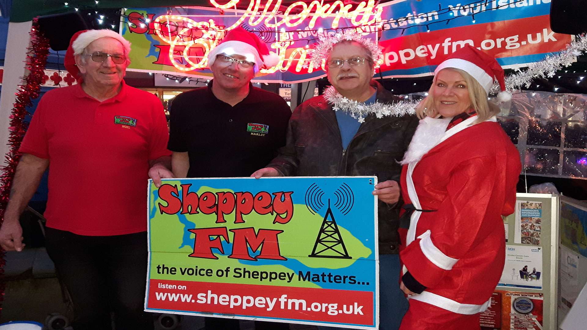 Members of the Sheppey FM Roadshow crew who were playing festive music at the clock tower