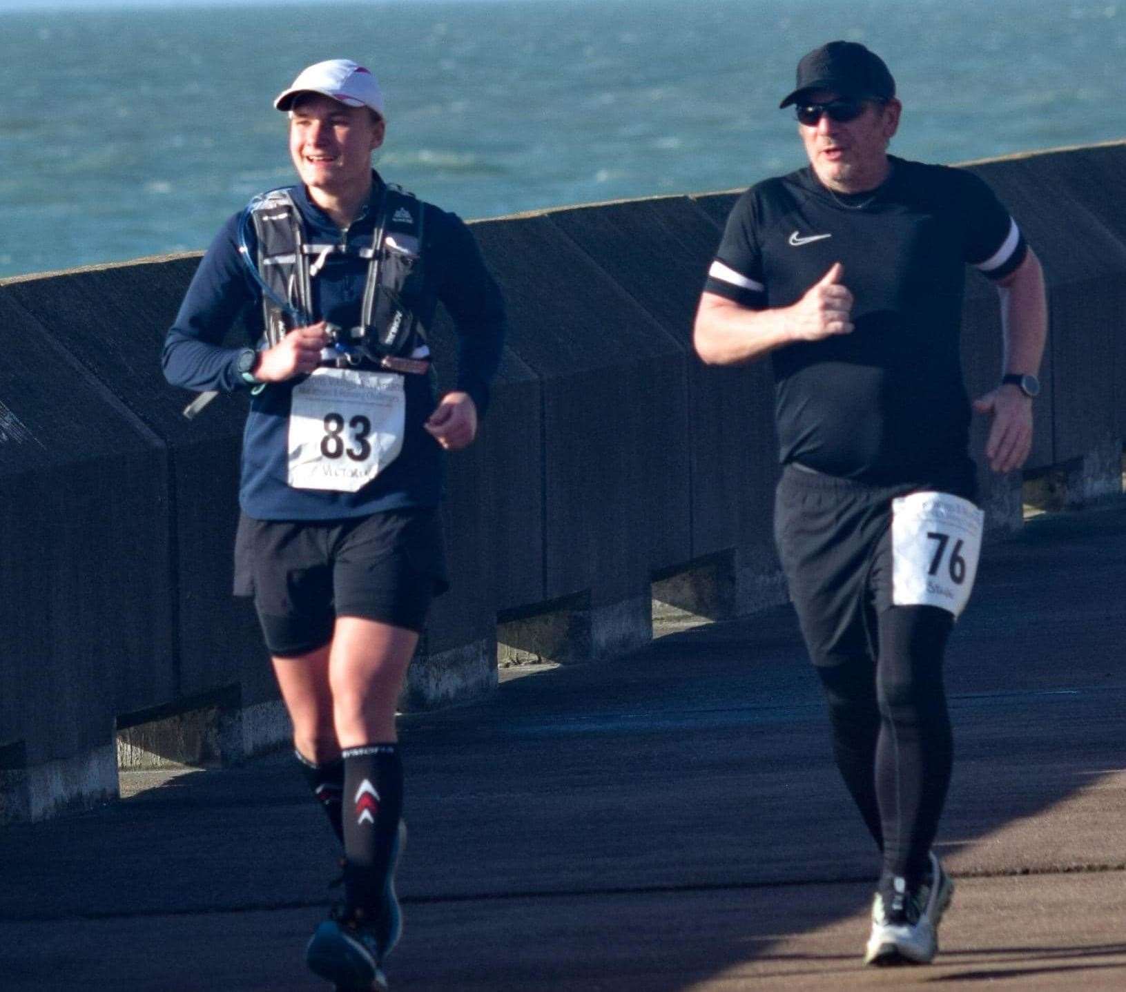Steve Bush running with Victoria Ward at Samphire Hoe moments before he collapsed Picture: Blackswan Photography