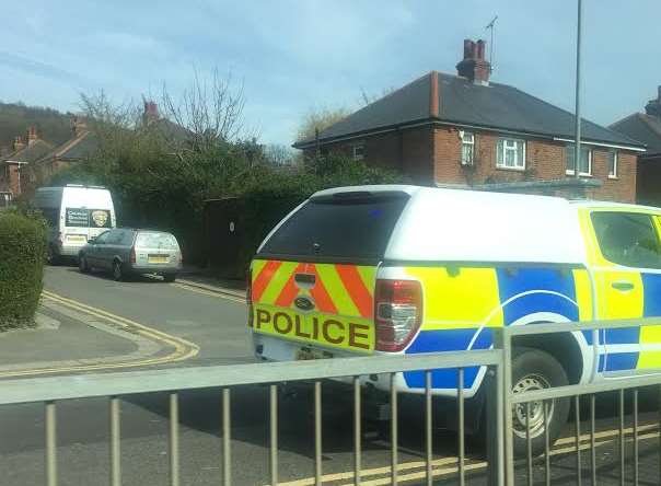 Police vehicles were seen in Hill Road, Folkestone