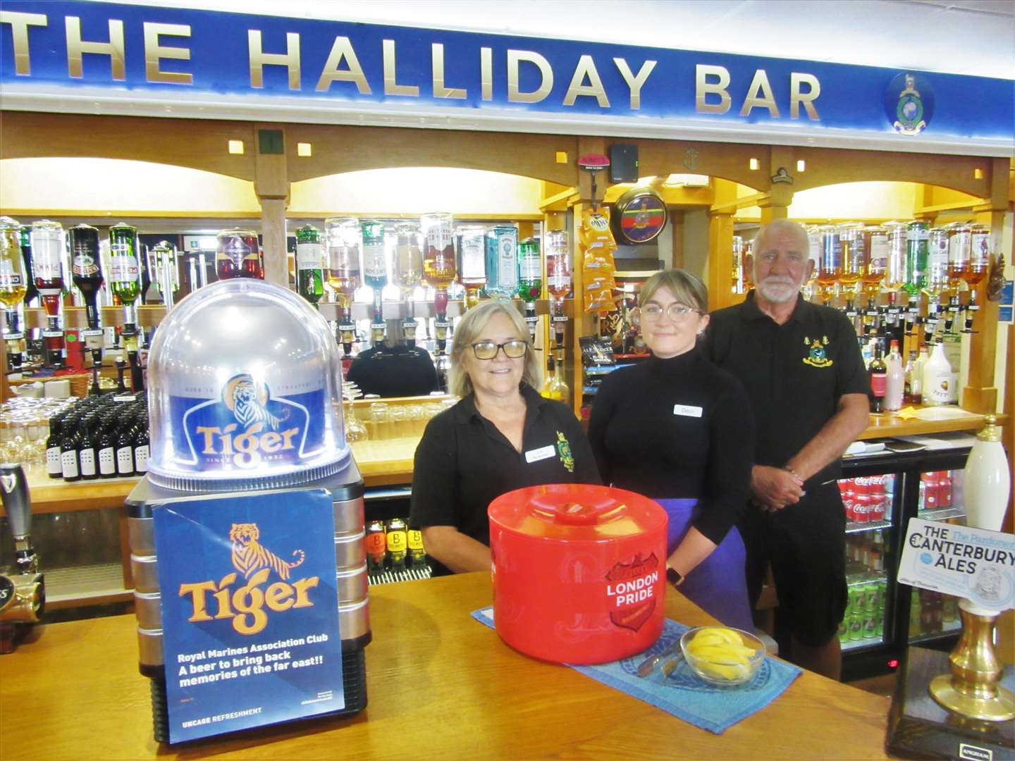 Ready to serve: The RMA Club's bar staff behind the refurbished Halliday bar: Linda Bennett (Manager) Deon Young and John Woodward who is also a branch member.