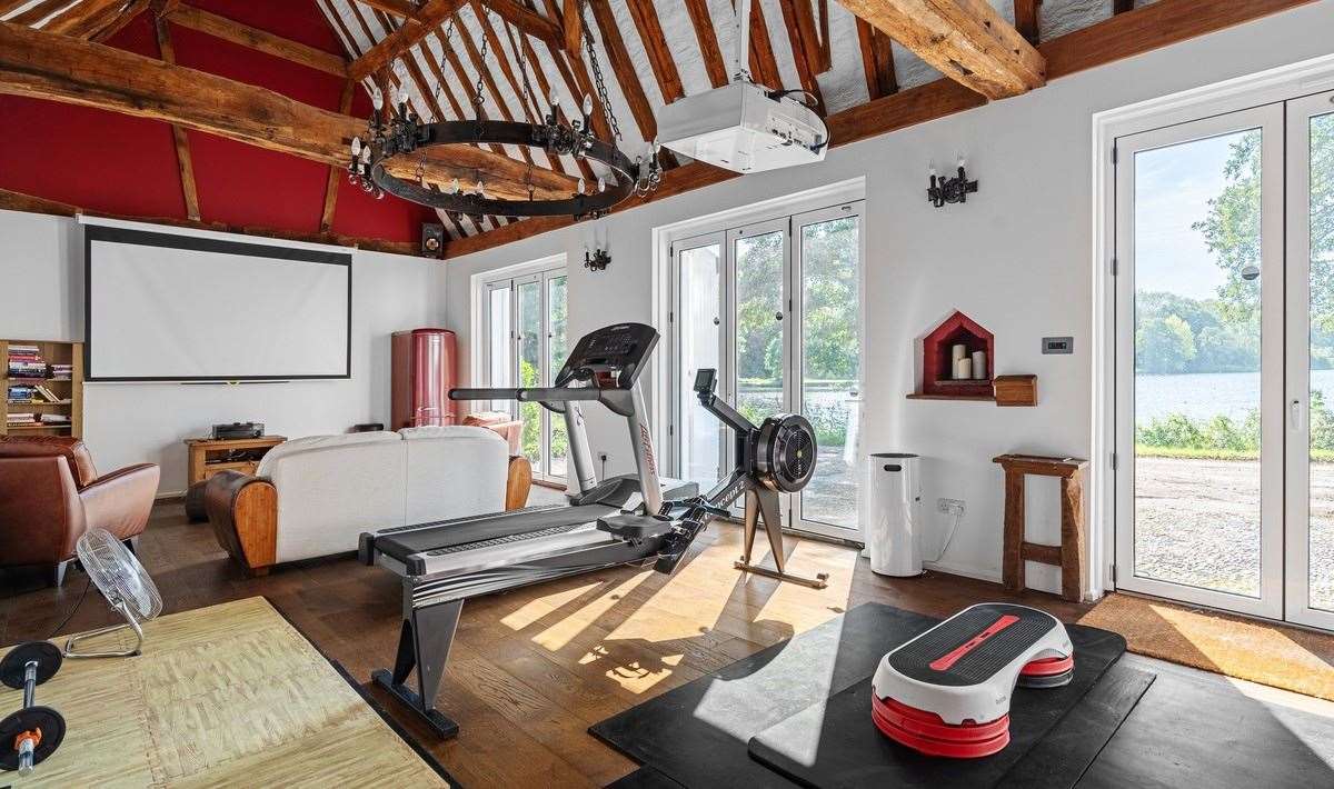 The garage has been converted into a home gym and cinema room. Picture: Tyron Ash International