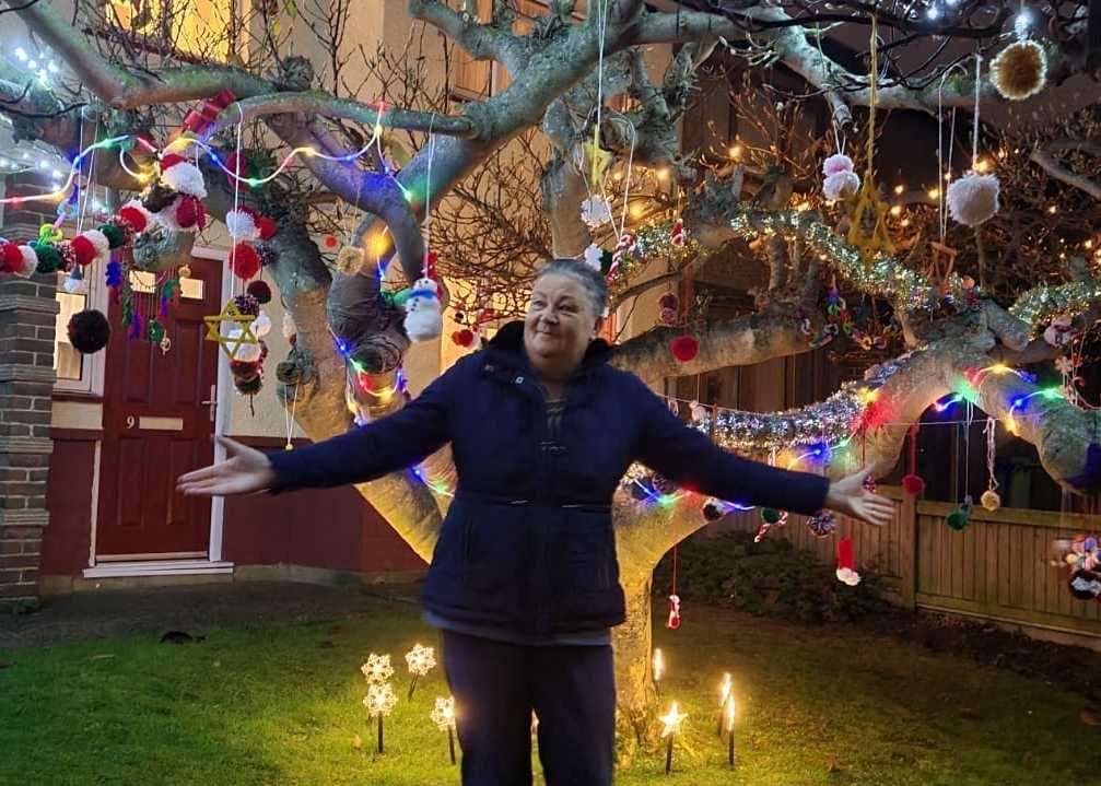 Linda Hilton has decorated a magnolia tree outside her home. Picture: Vicky Hilton