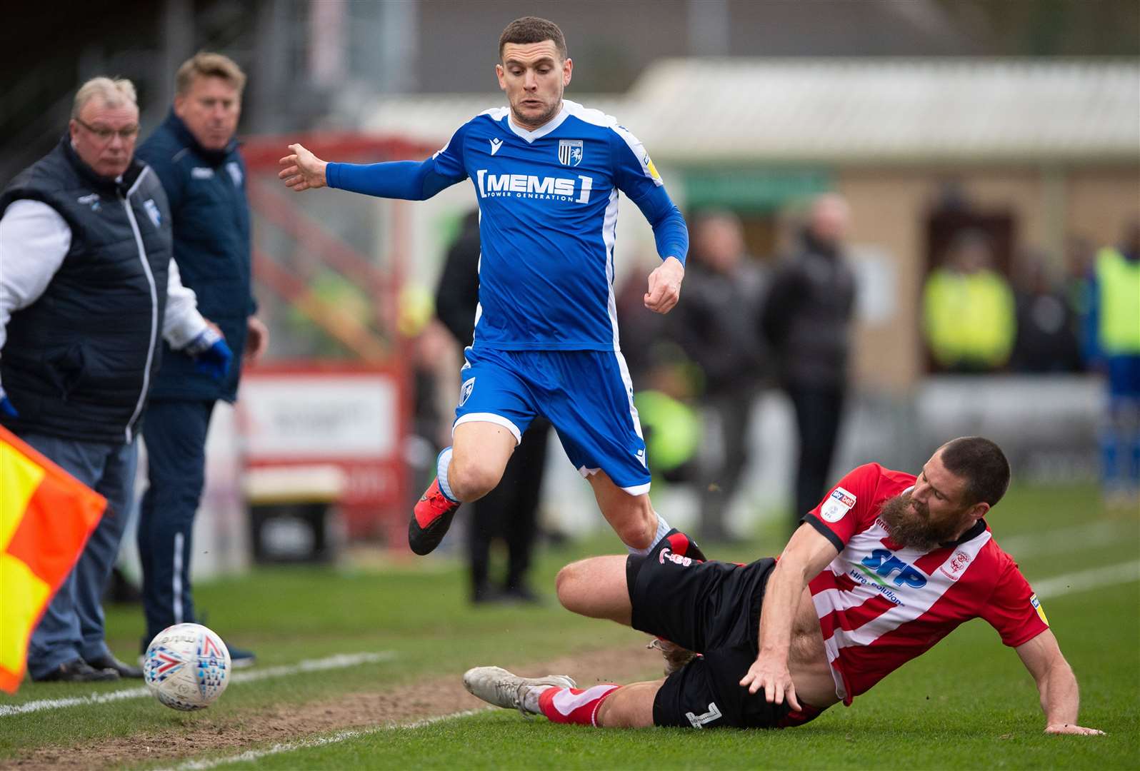 Gillingham midfielder Stuart O’keefe is challenged by Lincoln City's Michael Bostwick Picture: Ady Kerry