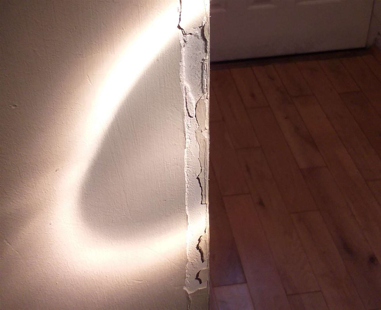 The couple's wall was damaged during the failed delivery