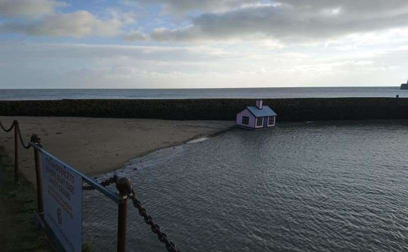 The pink house made a break for freedom on Sunday. Picture: Juliette Joyce Felton