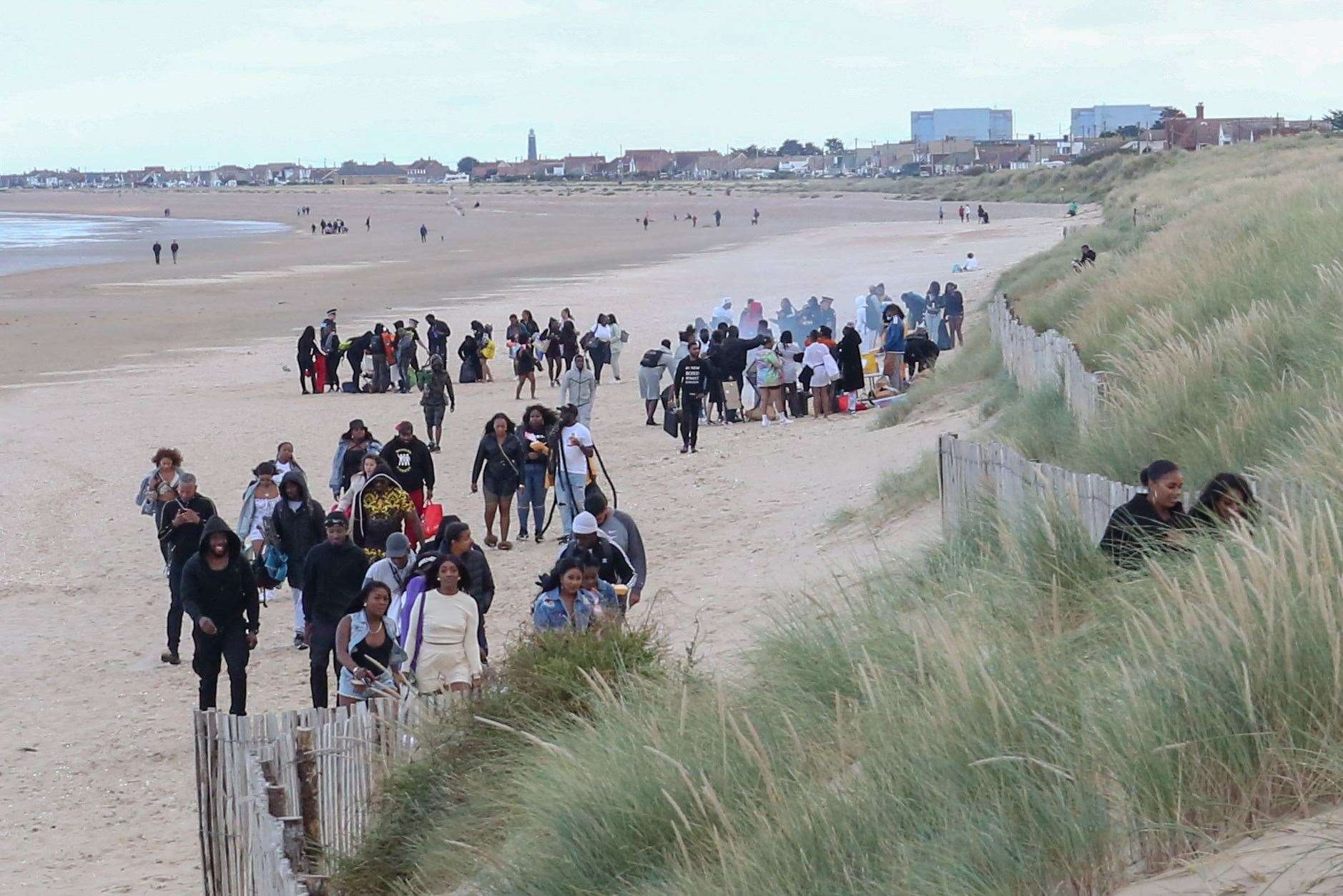 Crowds gather on the beach at Greatstone. Picture: UK News in Pictures