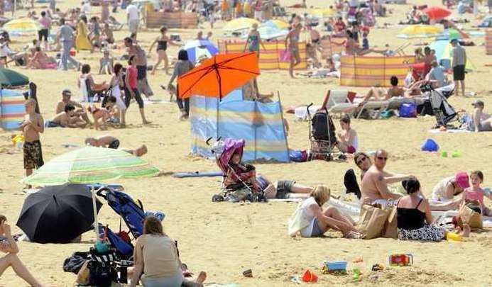 People enjoying the sun on Margate beach