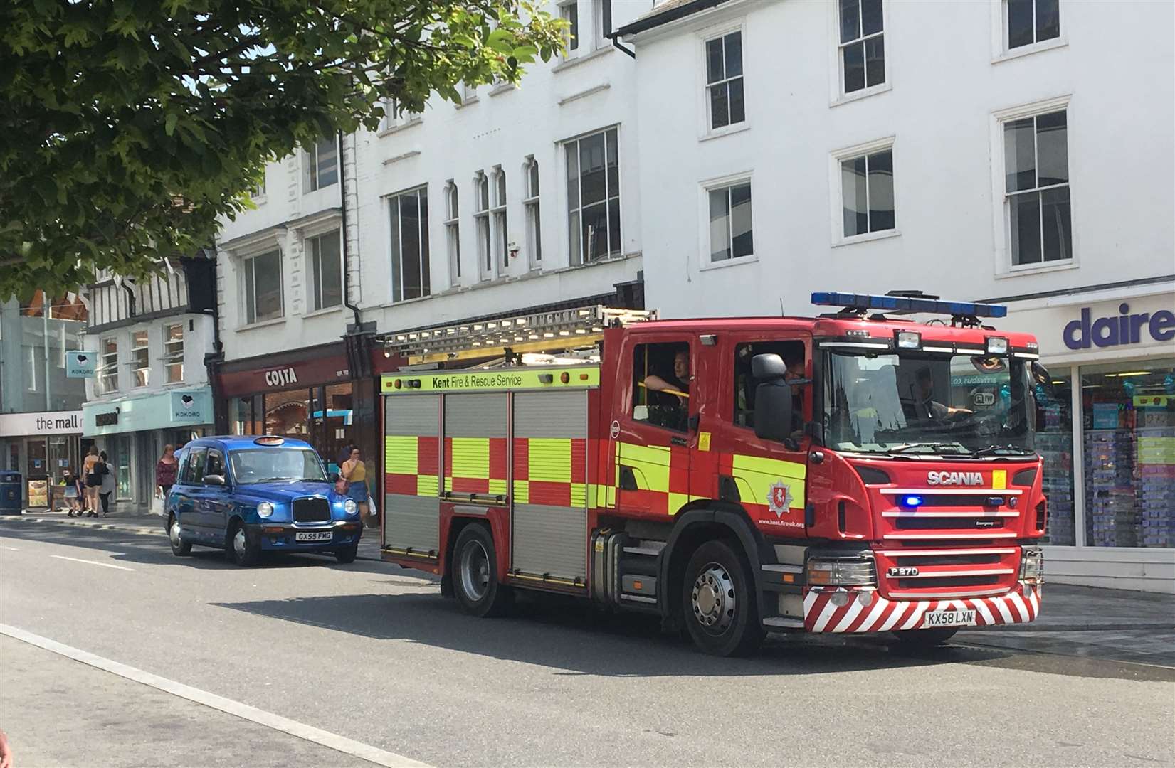 Firefighters refilled their pumps outside Costa Coffee in Maidstone following the fire in Mote Park