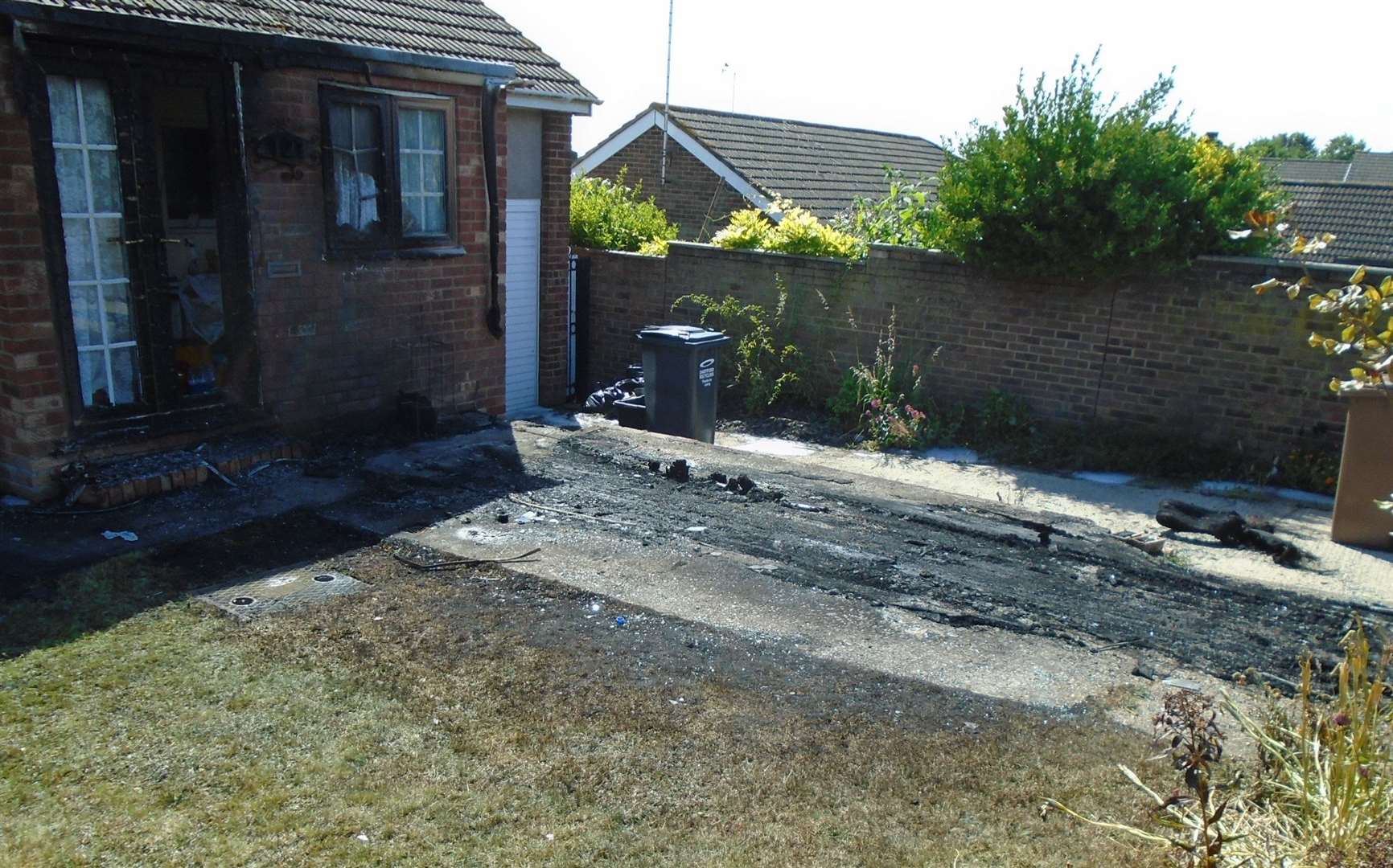 Damage to a bungalow in Stonewood, Bean, after a suspected arson attack