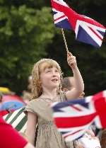 FLAG-WAVING: Six-year-old Katie Silvester. Picture: ANDY PAYTON