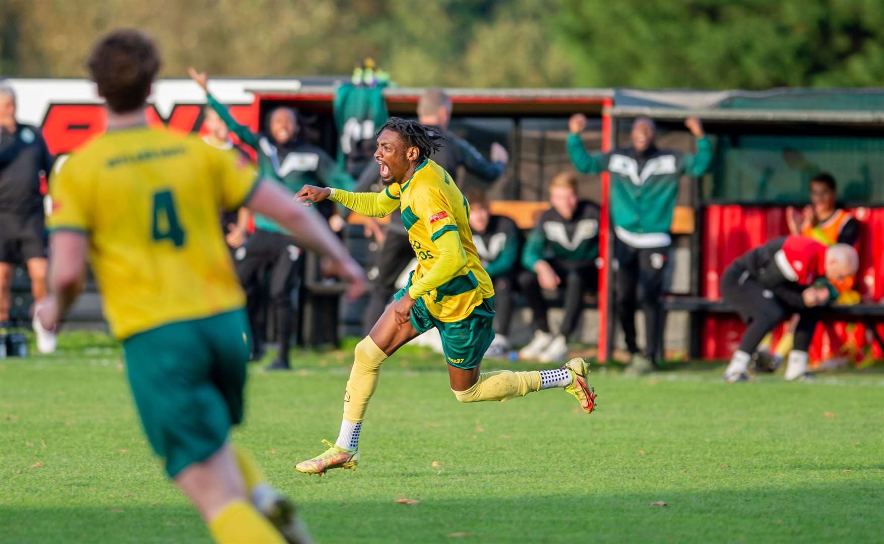 Gil Carvalho celebrates scoring Ashford's third at Sittingbourne. Picture: Ian Scammell