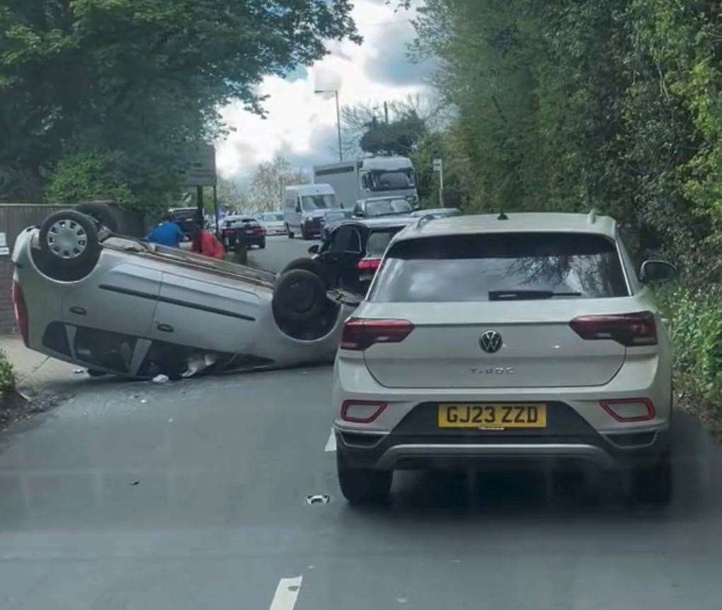 The car overturned by Blue Boys Roundabout in Tunbridge Wells. Photo: Dean Cummins