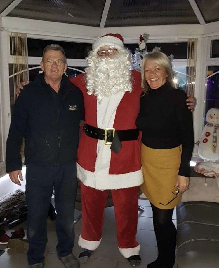 Grandparents Mark and Julie Murphy with Santa Claus. Picture: Annika Murphy