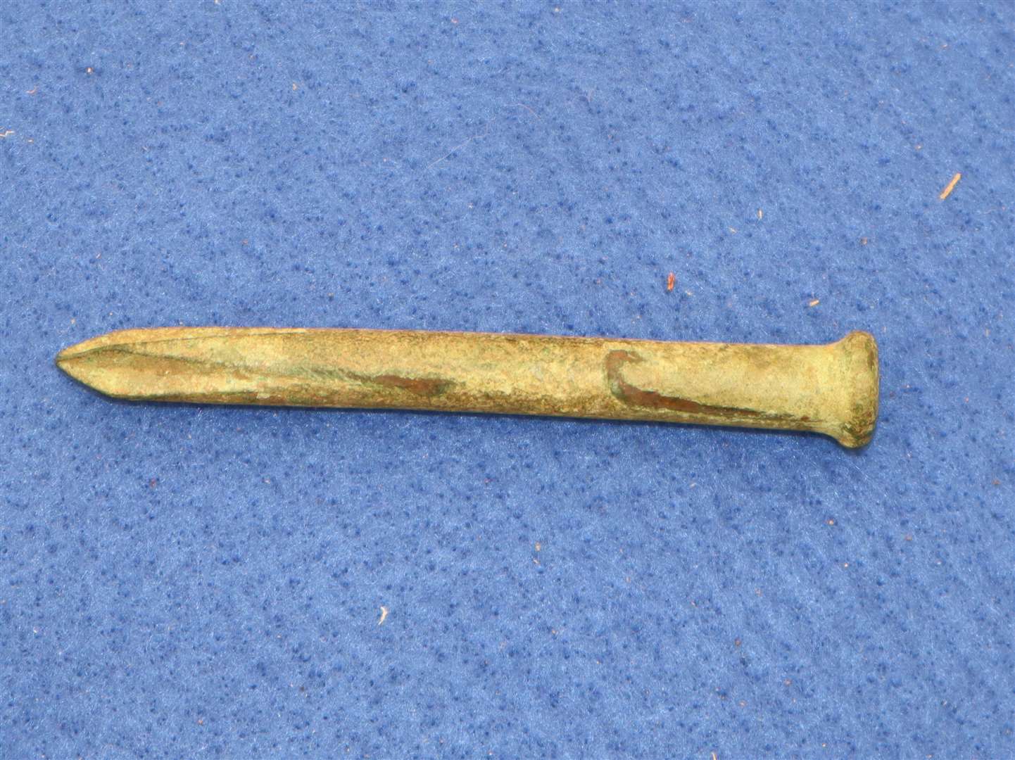 A bronze catapult bolt found at Minster during the Medway History Finders' rally. The grooves made it spin through the air creating a buzzing sign to frighten the enemy