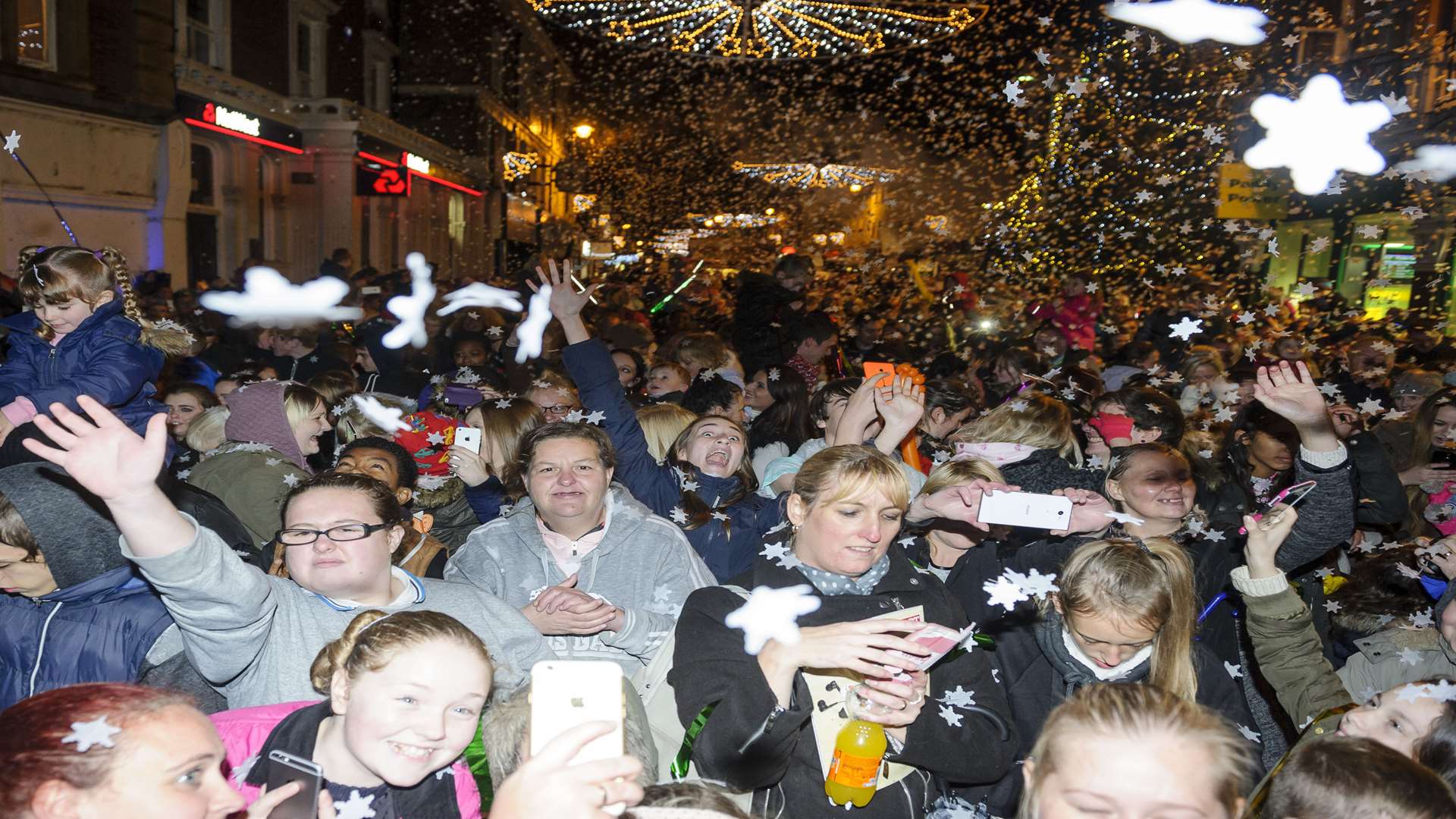 Snowflakes in the high street. Christmas lights 2015 switch-on, in High Street, Dartford.