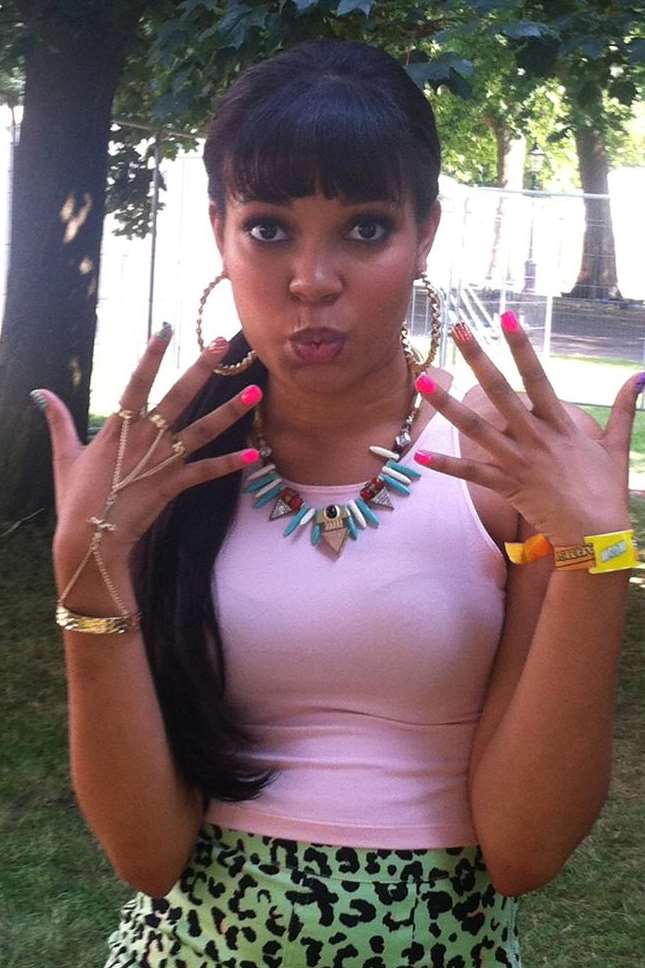 Dionne Bromfield showing off her Kiss nails and eyelashes