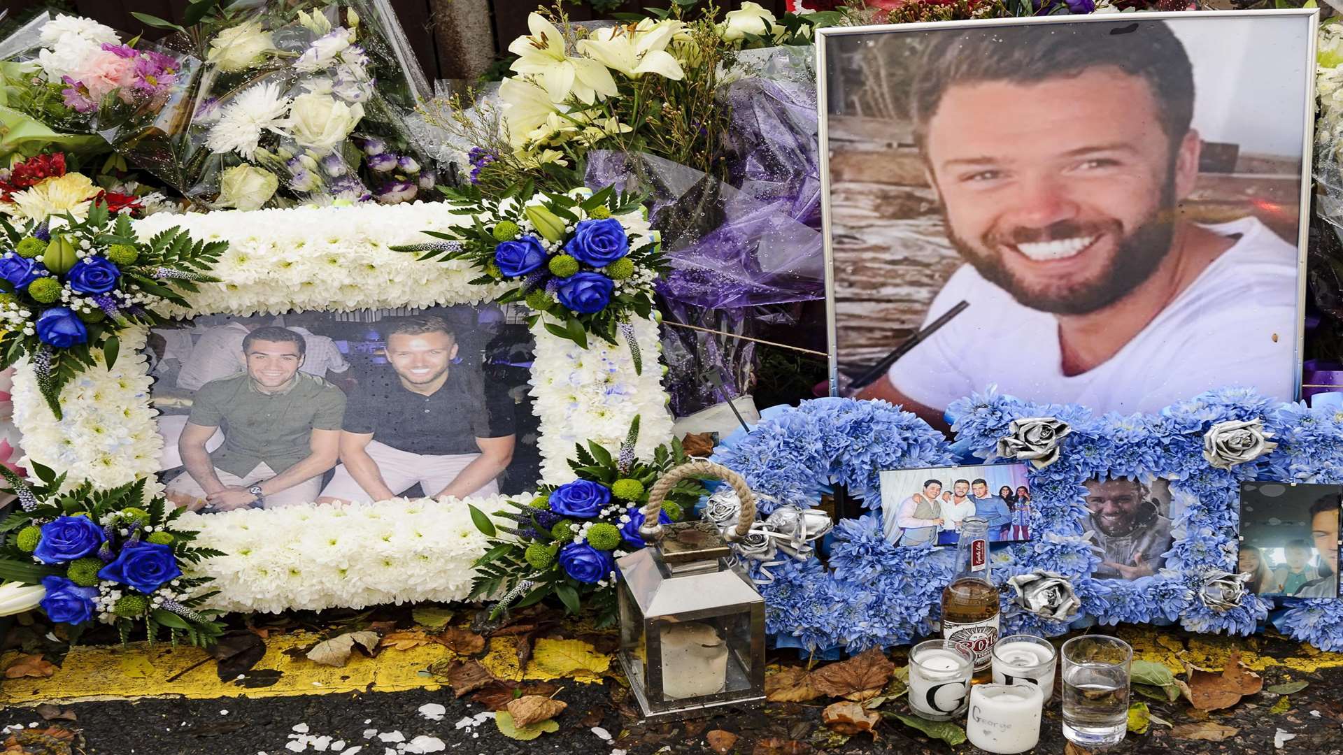 Photo and memories were among the floral tributes left for George Barker