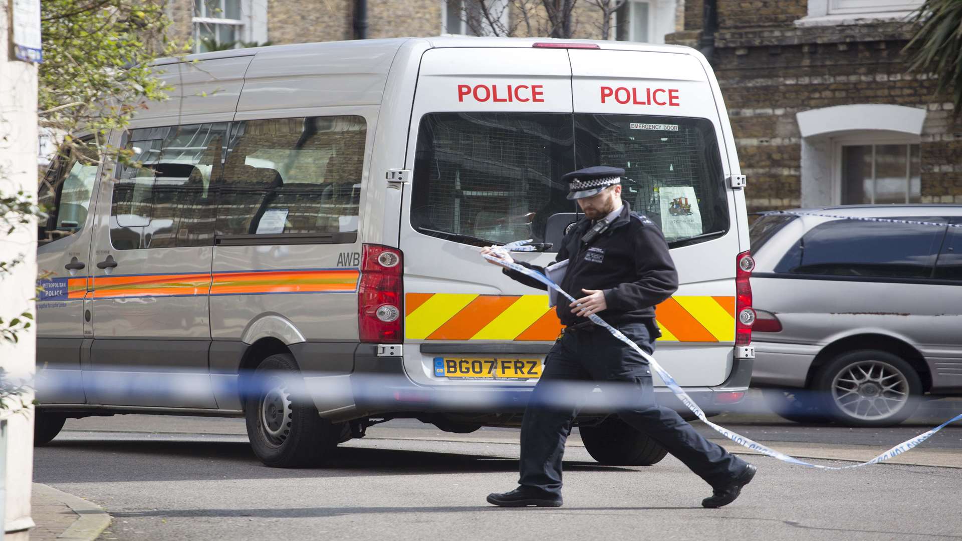 Police van at Southwark Estate where Mr Semple's remains were found. Picture: SWNS.