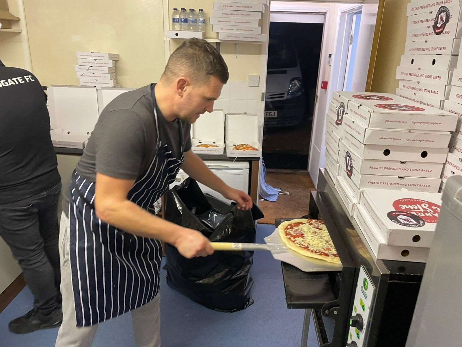 The club played a big role in dishing out pizzas to truckers at Manston at Christmas