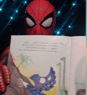 Spider-man reading a bedtime story