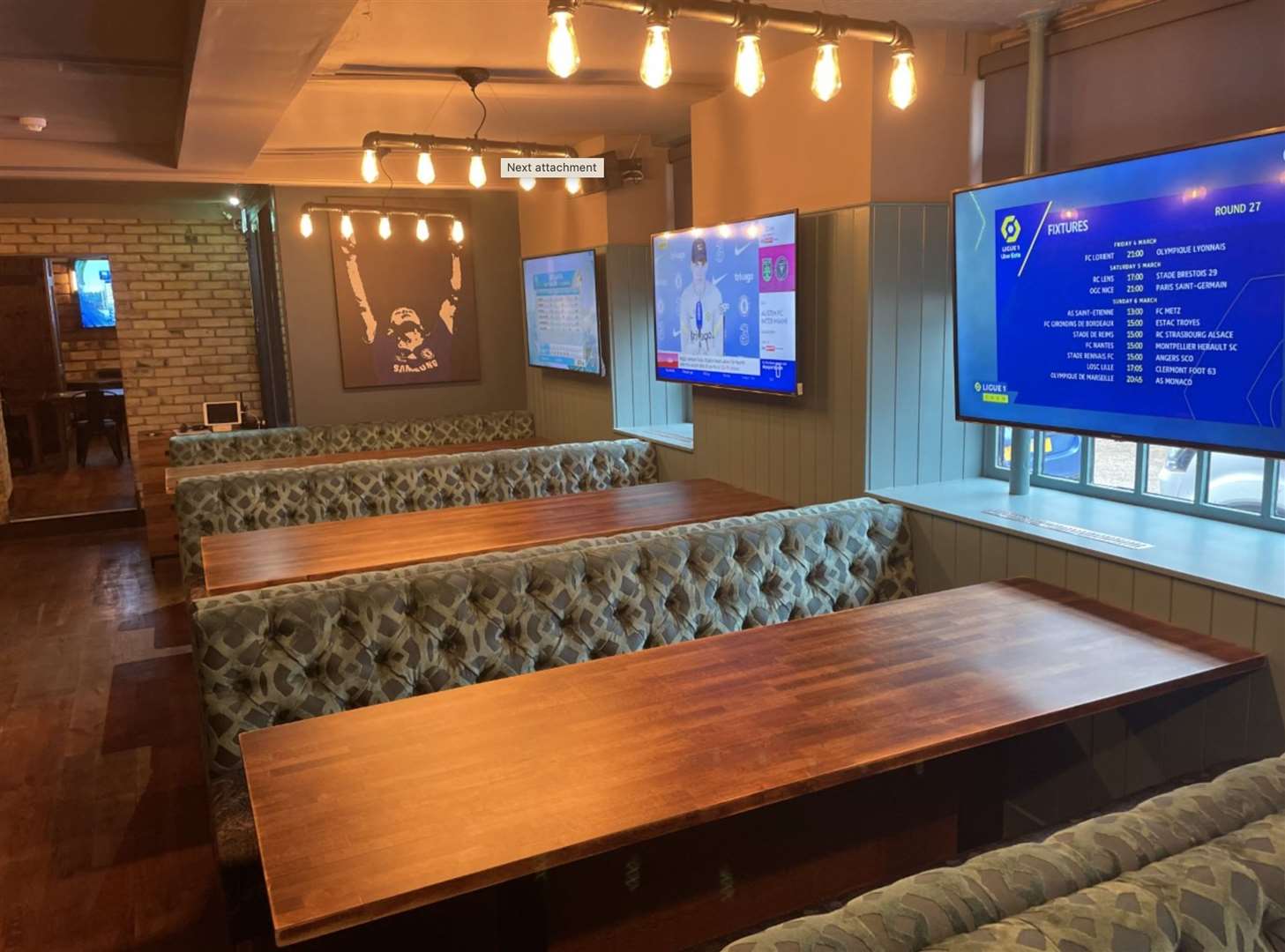 Each booth has individual TV screens and visitors can select which game or channel they want to watch. Picture: Admiral Taverns