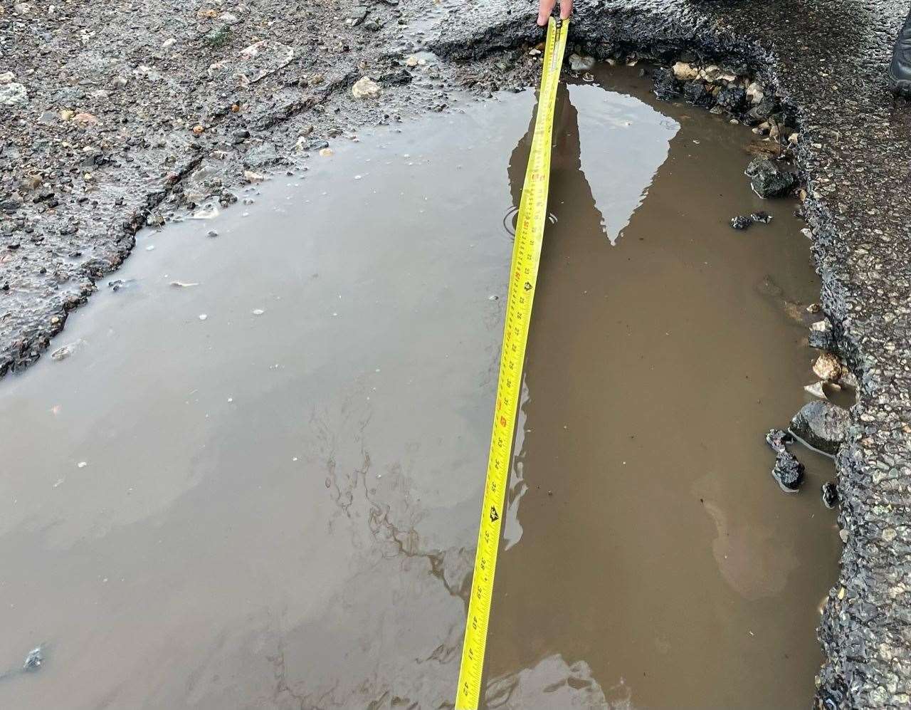 One of the potholes in Skinney Lane. Picture: Alan White