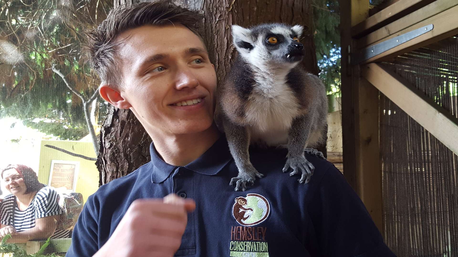 Henry Weedon, team leader, with Isaac the ring tailed lemur