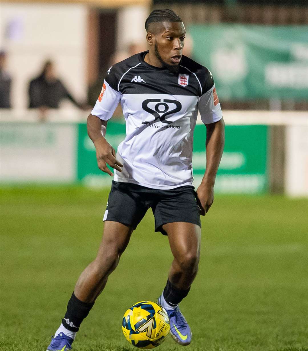 Faversham midfielder Bode Anidugbe assesses his options. Picture: Ian Scammell