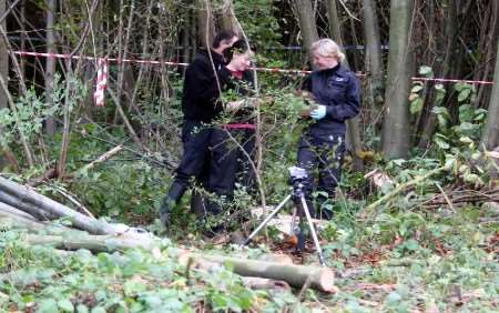 Police officers searching for clues in the woods. Picture: ANDY BARNES