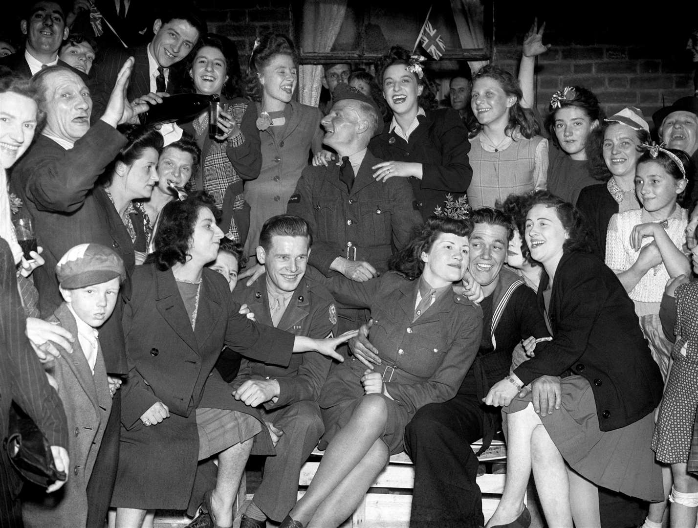 VE Day celebrations in the east end of London (PA)
