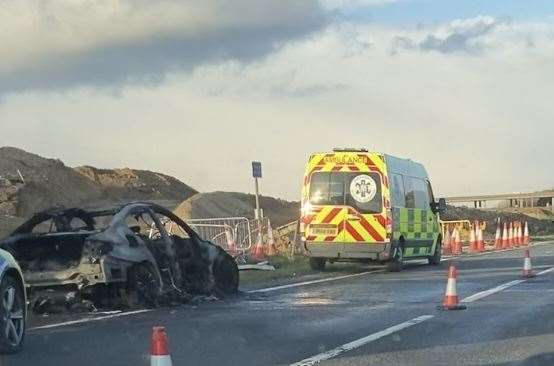The charred remains of a vehicle that caught fire on the A249 near Sittingbourne