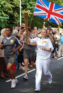The Olympic torch is carried through Eridge Road, Tunbridge Wells by Emily Barnes. Picture by Sarah Nunn
