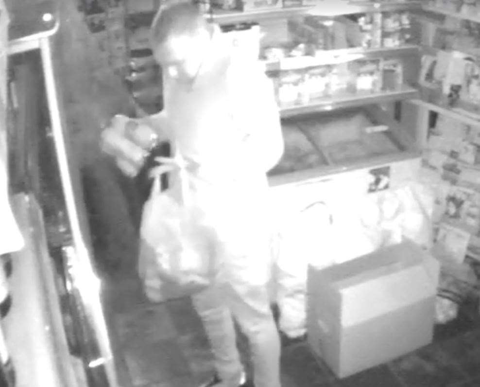 The thief can be seen on camera helping himself to cans from the fridge in Victory News in Broadstairs. (17792188)